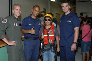Opa Locka Coast Guard members and summer camper.