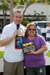 Lenor Ryan, Shops at Midtown Miami, receives plaque for being Top Dog Sponsor