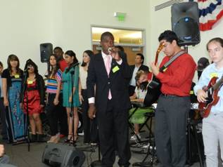 Julius Butler sings to the crowd