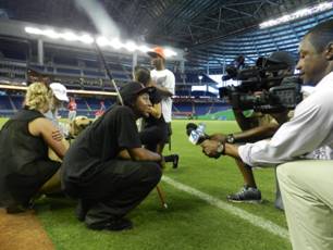 Summer camp student Davonte Pollard taking part in an on-field interview.