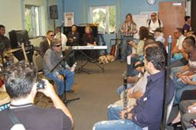Jose Feliciano speaks to the workshop group.