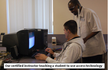 Our certified instructor teaching a student to use access technology