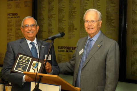 Gert Stein is presented Volunteer of the Year Award by Chairman Owen Freed.