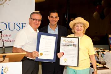 Florida State Representative Luis Garcia and City of Miami Commissioner Francis Suarez present President and CEO Virginia Jacko with Proclamations commemorating October 14th 2011 as White Cane Day