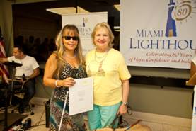 CEO Virginia Jacko with Luz Marina Rosenfeld, Top Pledge Winner