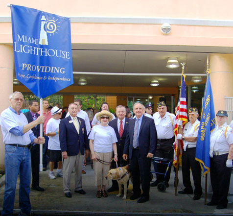 District Governor Juan Tejera, CEO Virginia Jacko, State Representative Luis Garcia, Miami-Dade County Mayor Carlos Gimenez, and walkers celebrate White Cane Day