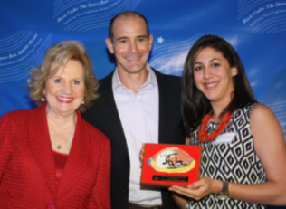 CEO Virginia Jacko, Board Director Agustin Arellano Jr., and Alexandra Dominguez aide to State Representative Jose Felix Diaz