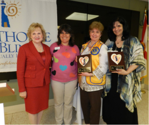 President & CEO Virginia Jacko, Coordinator of Arts & Crafts Nelbra Gonzalez, Honoree Lion Dilma Rodrigues and Honoree Edith La Riva.