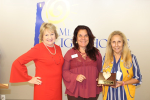 CEO Virginia Jacko, Nelba Gonzalez and Honoree Lion Maria Augusta Pusey.