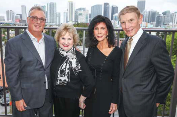 Miami Lighthouse Board Chair Louis Nostro, President and CEO Virginia Jacko with Trish and Dan Bell after ribbon cutting dedication of Trish and Dan Bell East Terrace