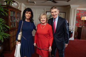 Trish and Dan Bell with President and CEO Virginia Jacko