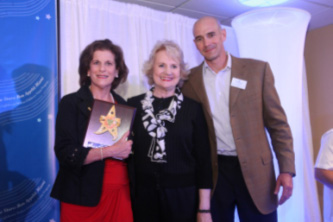 Marsha Tejeda of Baptist Health South Florida, CEO Virginia Jacko, Board Chairman Agustin Arellano, Jr.